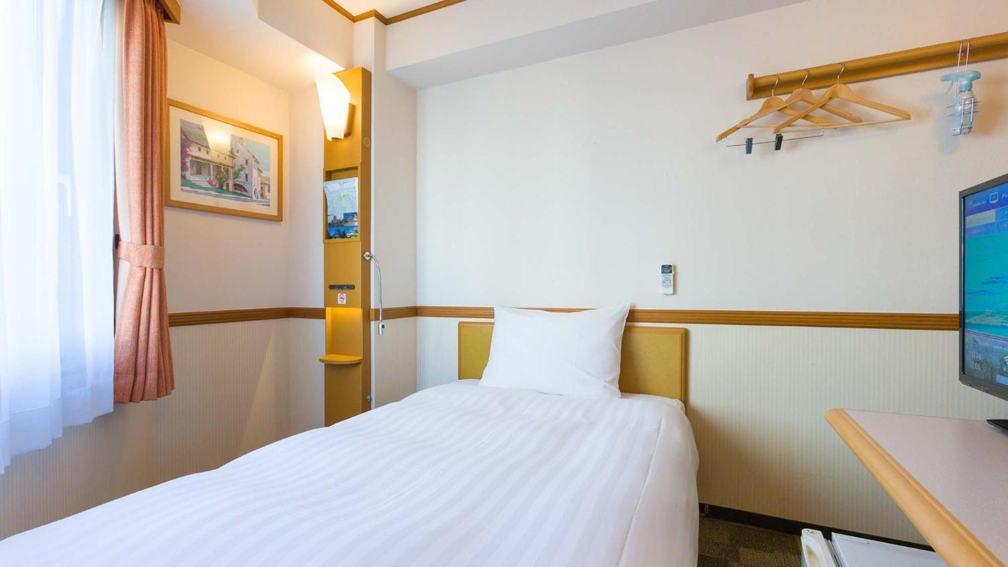 Toyoko Inn Okayama Eki Nishi Guchi Hiroba Szoba fotó
